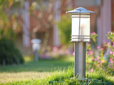 Outdoor lamp on yard lawn for garden lighting in summer park